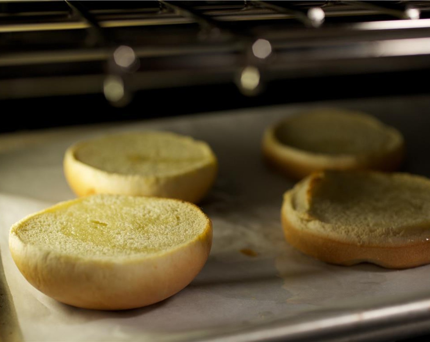 step 9 Open the Potato Buns (2) and place on a sheet pan and heat in the oven for 2 minutes. Remove from oven and keep warm for plating.