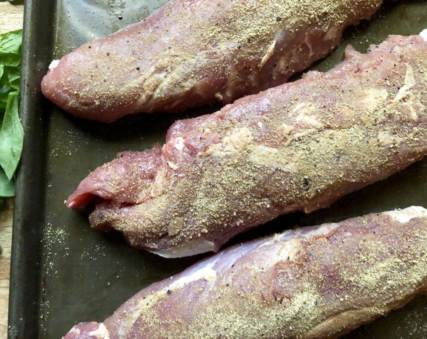 step 8 Trim any fat and sinew from the Pork Tenderloin (3).  Evenly coat the tenderloins with the spice mixture.