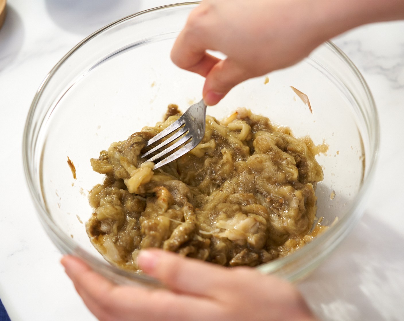 step 5 Use a fork to break them apart into fine pieces.