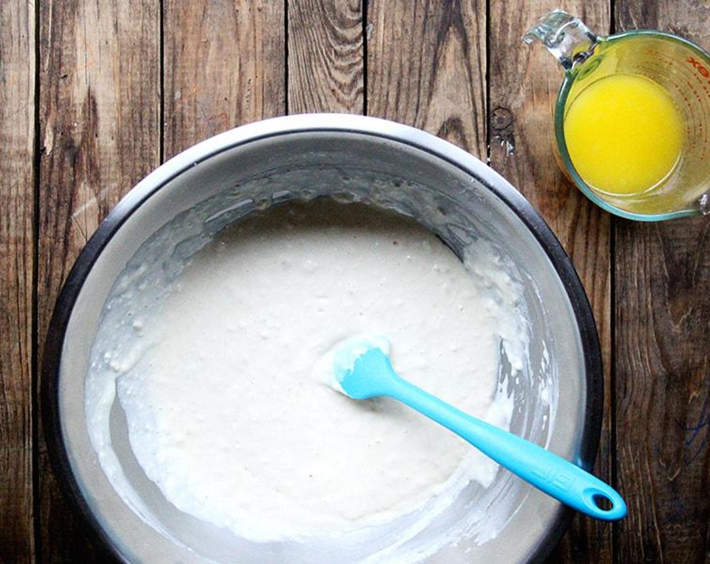 step 2 Add the Buttermilk (480 mL) and Milk (120 mL), and stir with spatula to combine. Add the Unsalted Butter (140 g) and stir until combined.
