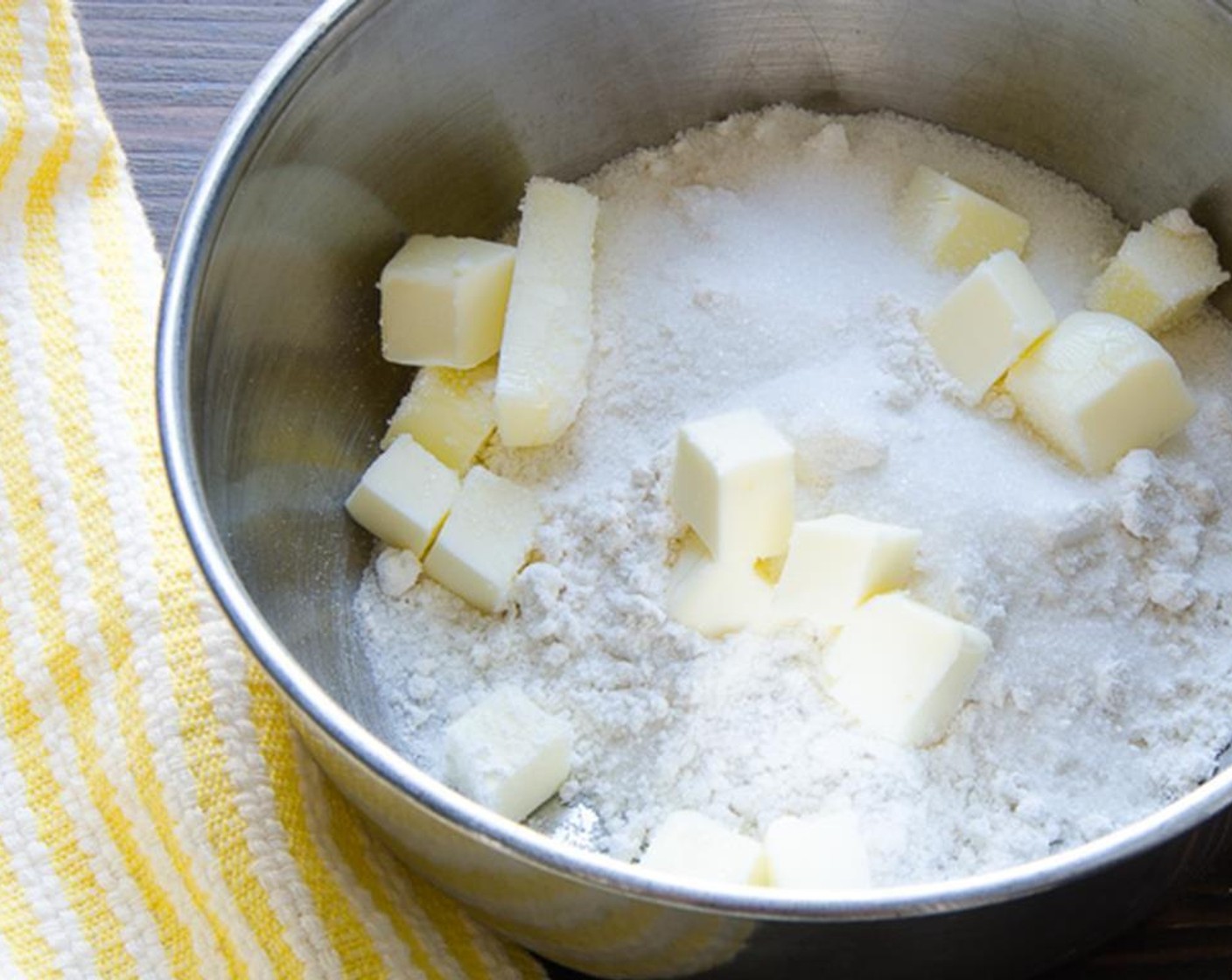 step 2 Cut the Butter (2 Tbsp) into 1/4" dices. In a small bowl combine the All-Purpose Flour (1/3 cup), butter, and Granulated Sugar (1 Tbsp). Use fingertips to blend the ingredients together until they form small crumbles and hold together when you pinch some between your thumb and forefinger.