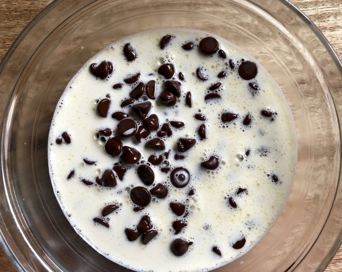 step 8 Pour the Heavy Cream (1/2 cup) into a microwave-safe bowl and heat in the microwave until simmering, about 45 seconds. Pour the hot cream over the chocolate chips. Let stand for two minutes, then stir until smooth.