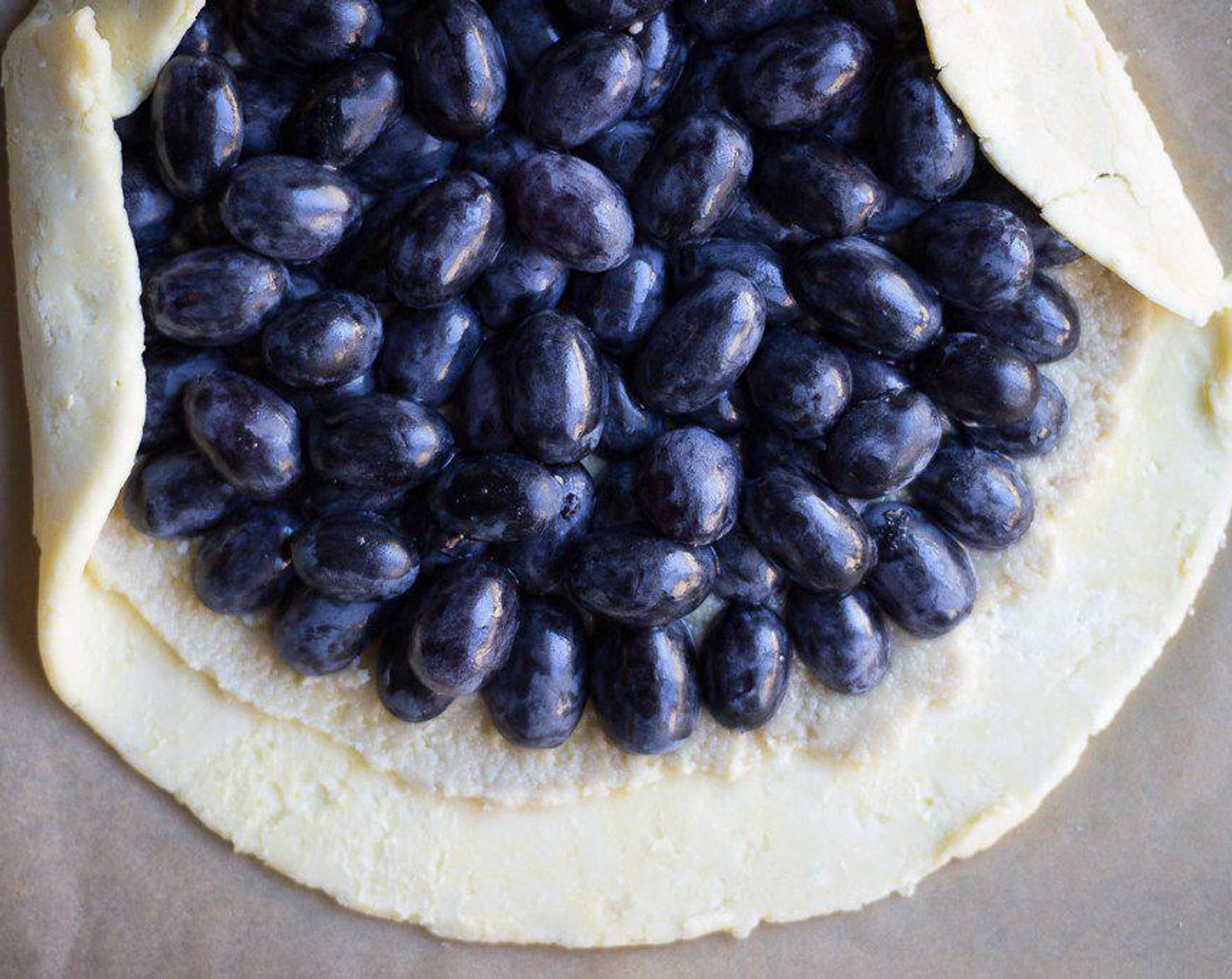 step 5 Place Grapes (2 1/4 cups) cut side down on top of halva, leaving about 1-inch border around the edge of the halva.