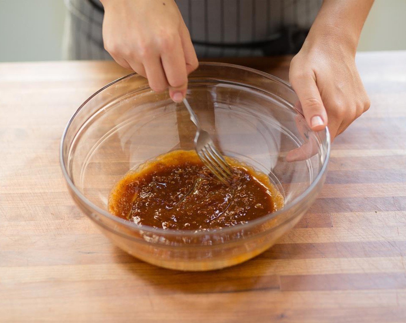 step 6 In a large bowl, whisk together Teriyaki Sauce (4 Tbsp), Peanut Butter (4 Tbsp), Rice Vinegar (2 tsp), and Sriracha (2 tsp) until smooth.