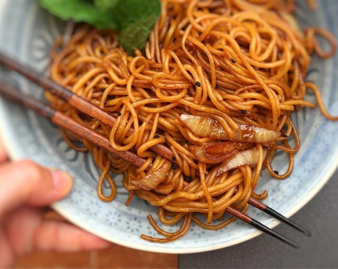 step 6 Transfer the noodles onto plates and serve hot. Enjoy!