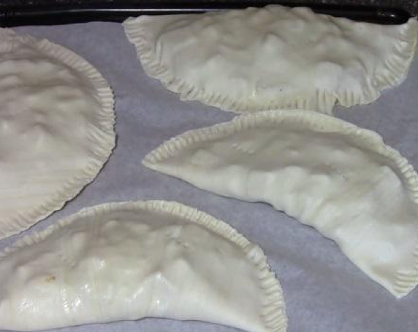 step 3 Cut a circle out of the Puff Pastry (4 sheets). Divide the vegetable mixture among the four circles, and fold each pastry to close everything. Using a fork, make some vent holes on top of each pastry and bake at 400 degrees F (200 degrees C) for about 20 minutes.