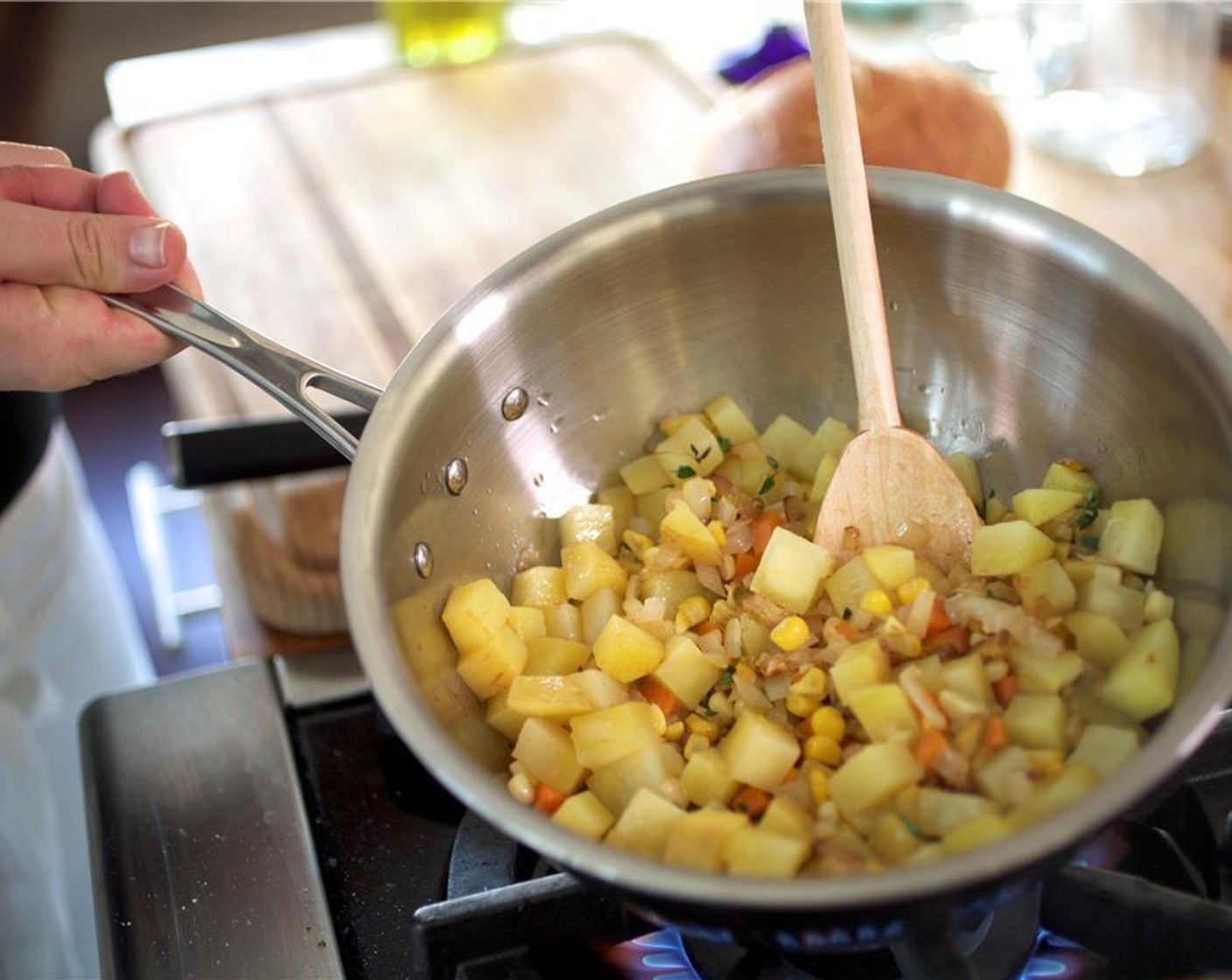 step 9 Add Yukon Gold Potatoes (2) and half of the Fresh Thyme (3 1/2 Tbsp). Stir.