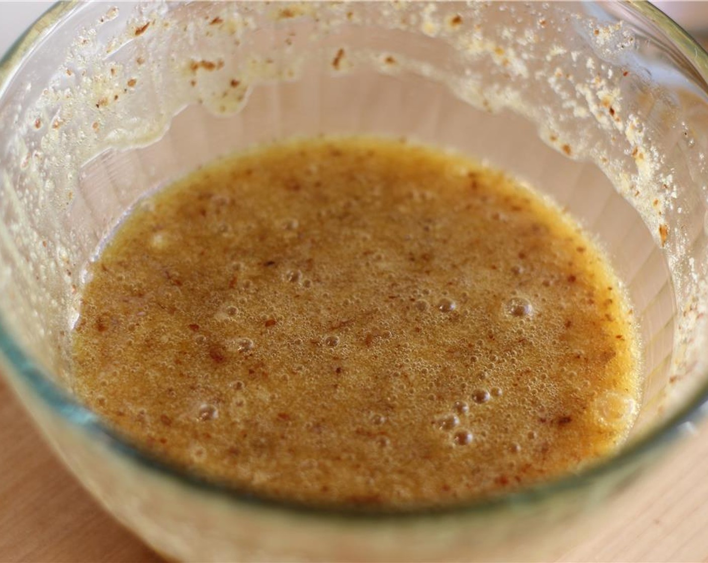 step 4 While the chocolate is melting, whisk Eggland's Best Classic Eggs (2) and Granulated Sugar (1/2 cup) together. When blended, add Almond Meal (3 Tbsp) and stir just to combine.