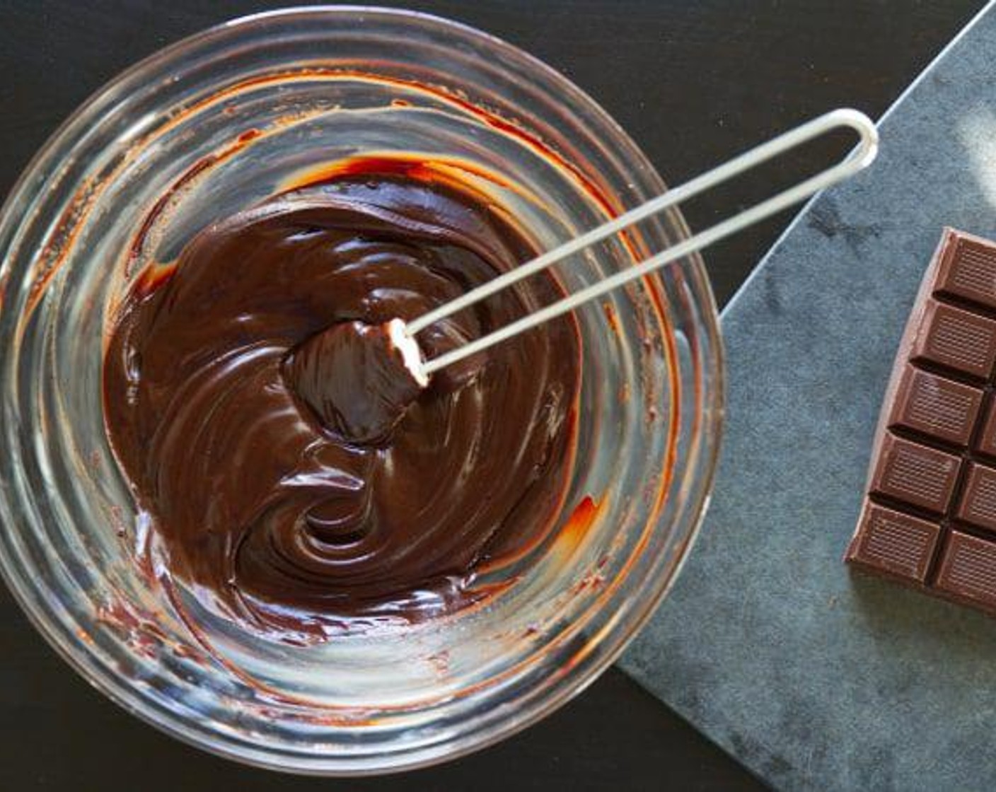 step 1 Heat the Heavy Cream (1/2 cup) until in just bubbles. Pour over the Dark Chocolate (1 1/4 cups) and Rum (1/4 cup). Mix well with a rubber spatula. If you still have lumps, put the bowl over a bain marie and mix until smooth.