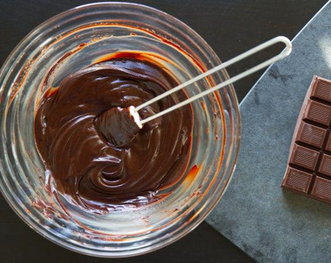 step 1 Heat the Heavy Cream (1/2 cup) until in just bubbles. Pour over the Dark Chocolate (1 1/4 cups) and Rum (4 Tbsp). Mix well with a rubber spatula. If you still have lumps, put the bowl over a bain marie and mix until smooth.