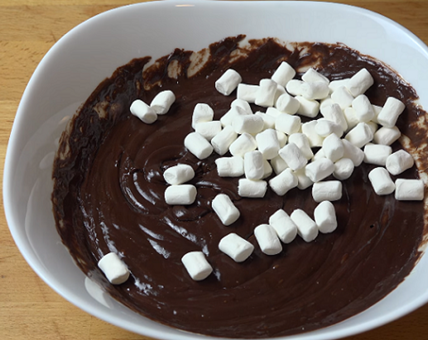 step 3 To the still hot chocolate, stir in the Mini Marshmallows (1/2 cup) until completely melted and combined.