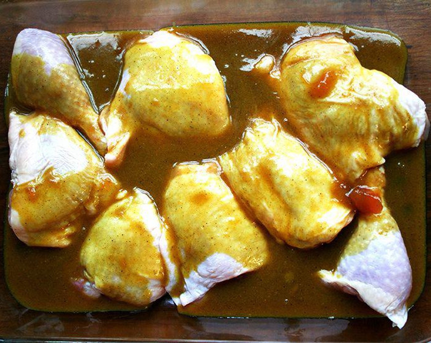 step 4 Pour over the chicken then toss with a spatula (or your hands) so that the pieces are nicely coated and so the sauce fills the underside of the chicken.