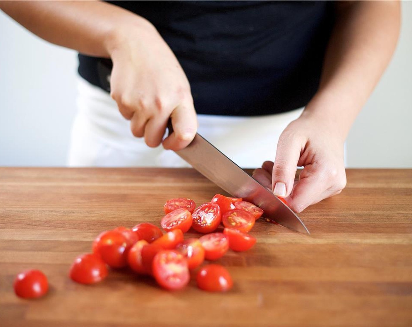 step 2 Peel the Red Onion (1) and slice into quarter inch diced pieces. Add to a medium bowl. Slice the Cherry Tomato (1 cup) in half lengthwise, and add to the same bowl. Peel the Persian Cucumber (1) and slice in half lengthwise then slice into half inch diced pieces, add to bowl.