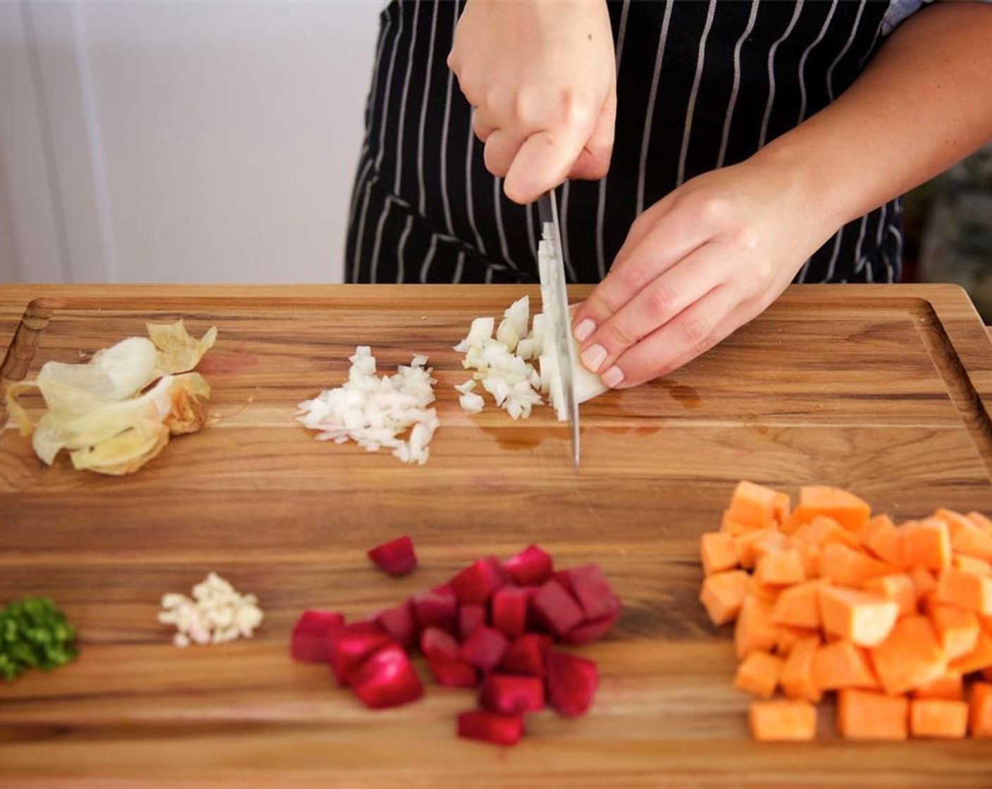 step 5 Peel the Sweet Potato (1) and Beets (2). Cut both into half inch cubes and place in medium bowl. Peel and chop the Onion (1) into quarter inch pieces. Add to the medium bowl.