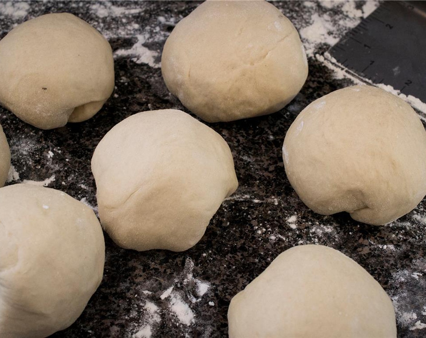 step 8 Divide the dough into 8 equal pieces. With a moist tea towel, cover any dough you are not immediately working with.