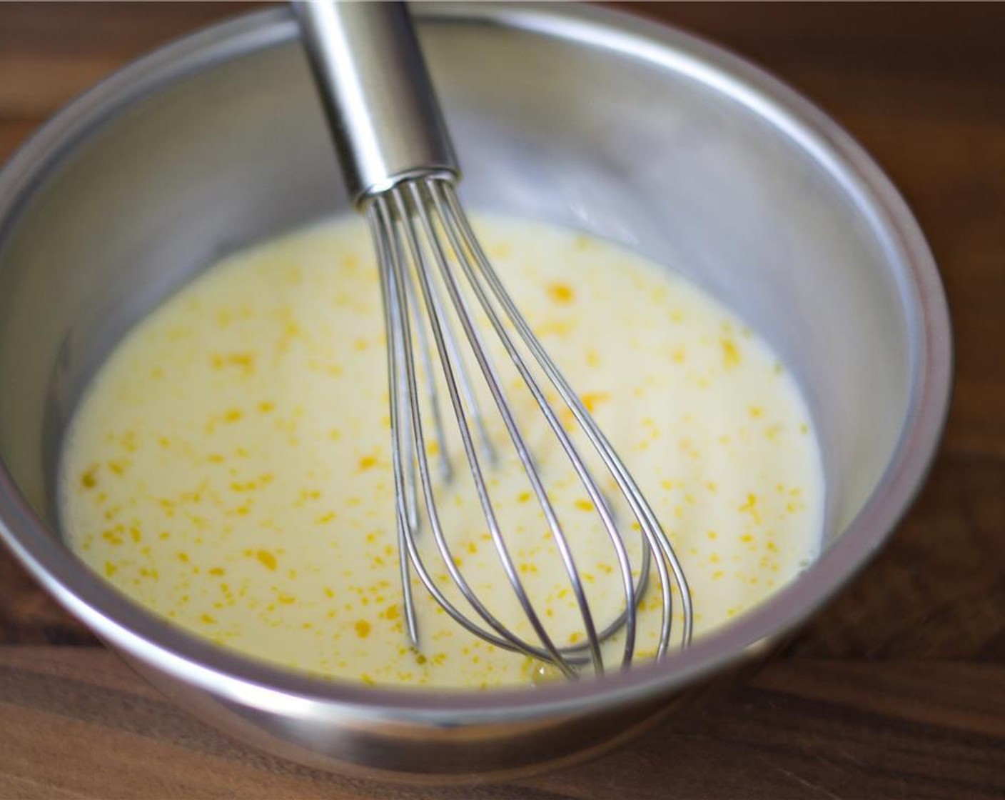 step 5 Separate the Eggland's Best Classic Egg (1) and in a small bowl, whisk together the egg yolk and Milk (3/4 cup). Reserve the egg white for later.