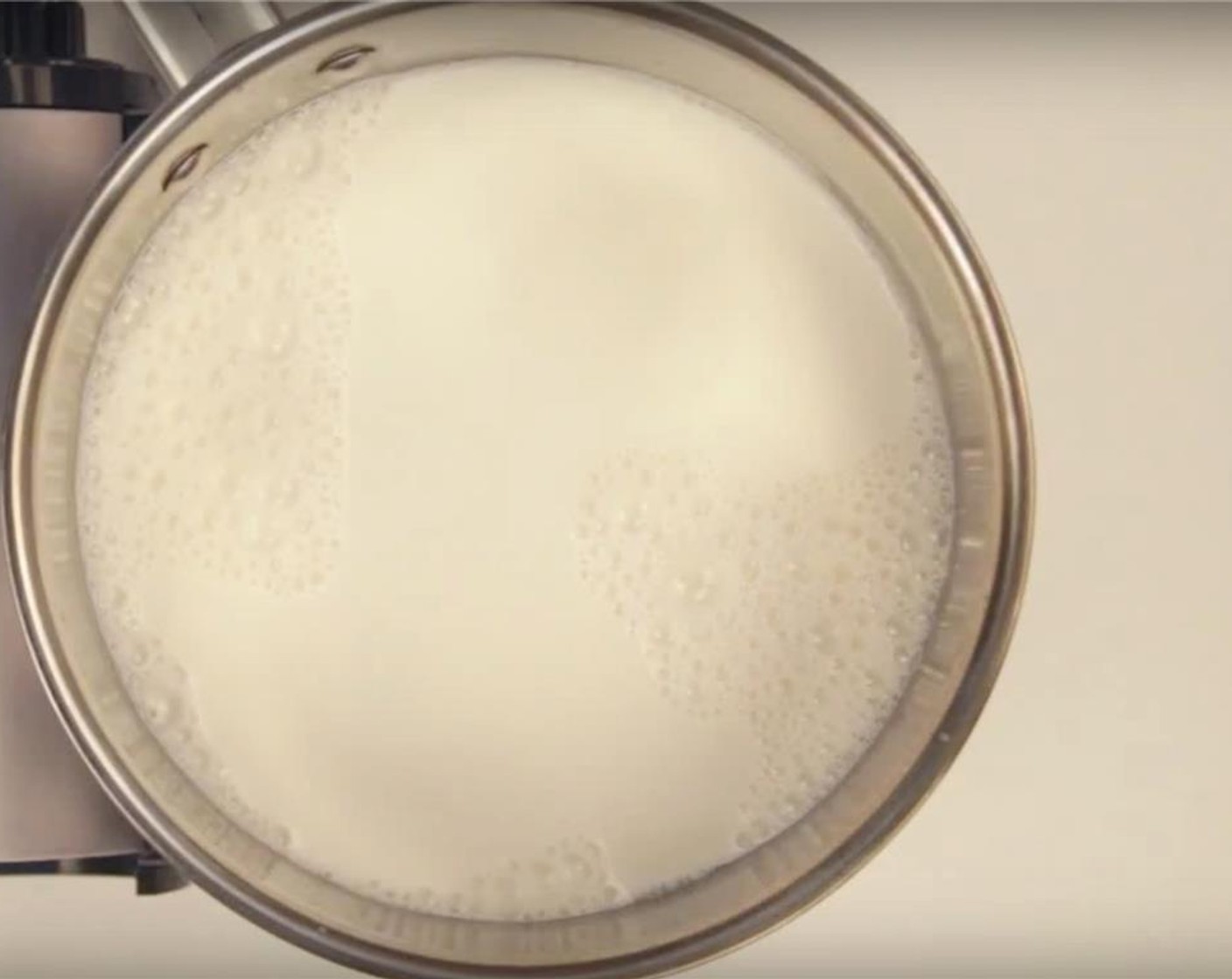 step 1 Heat Milk (4 cups) in a medium-sized saucepan on medium - high heat until beginning to warm and steam.