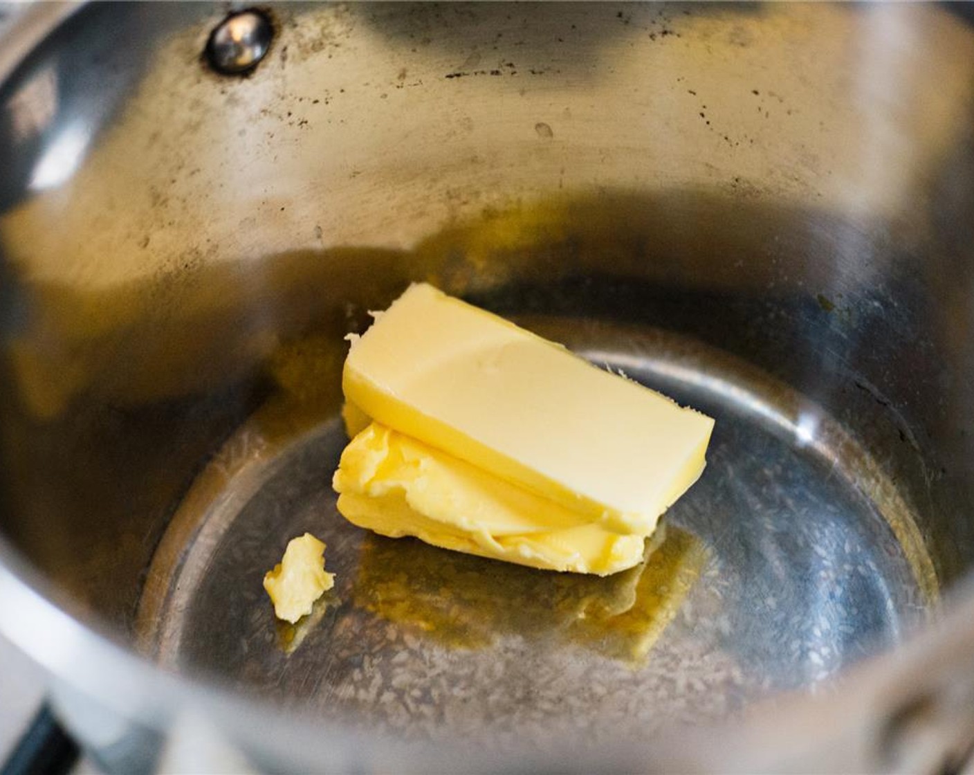 step 1 Melt Salted Butter (3 1/2 Tbsp) in a saucepan over medium heat.