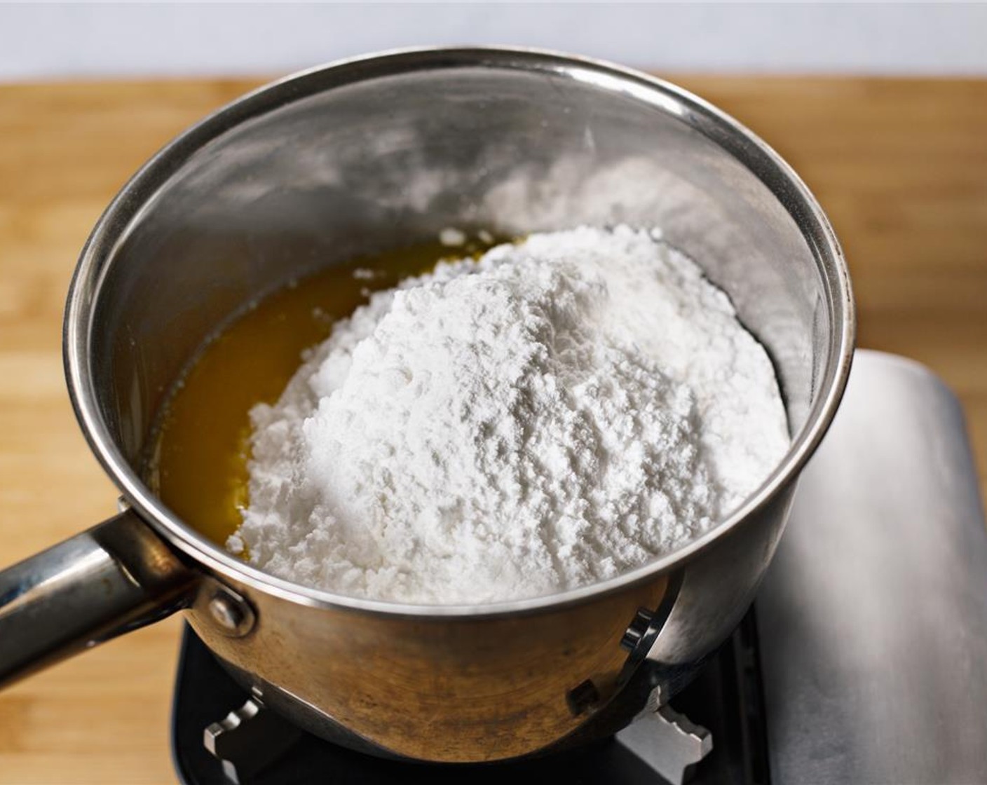 step 2 Turn off heat and add Powdered Confectioners Sugar (4 1/2 cups).