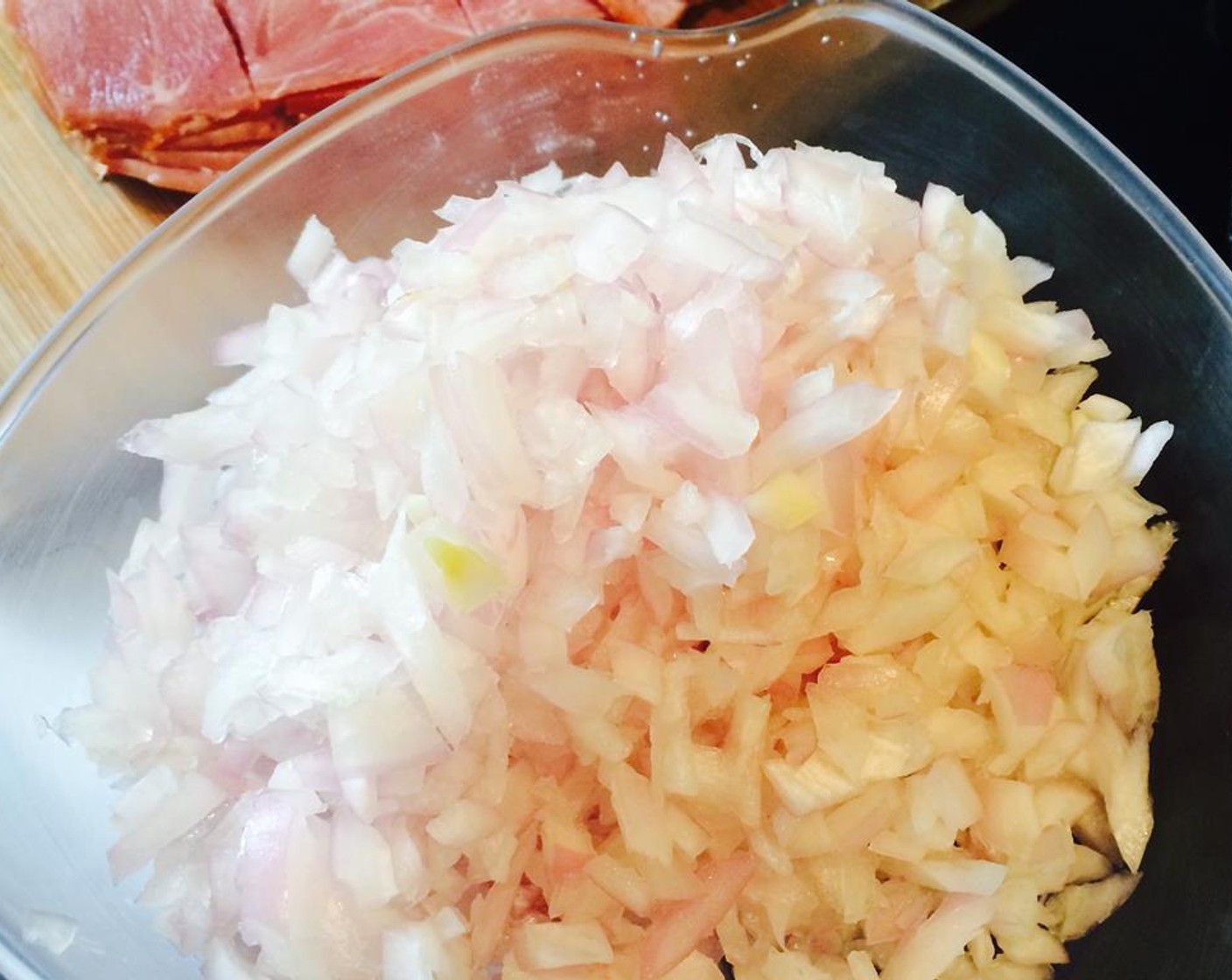 step 5 Finely chop the Onion (1), Scallion (1 stalk) and mince the Garlic (5 cloves). Set aside.