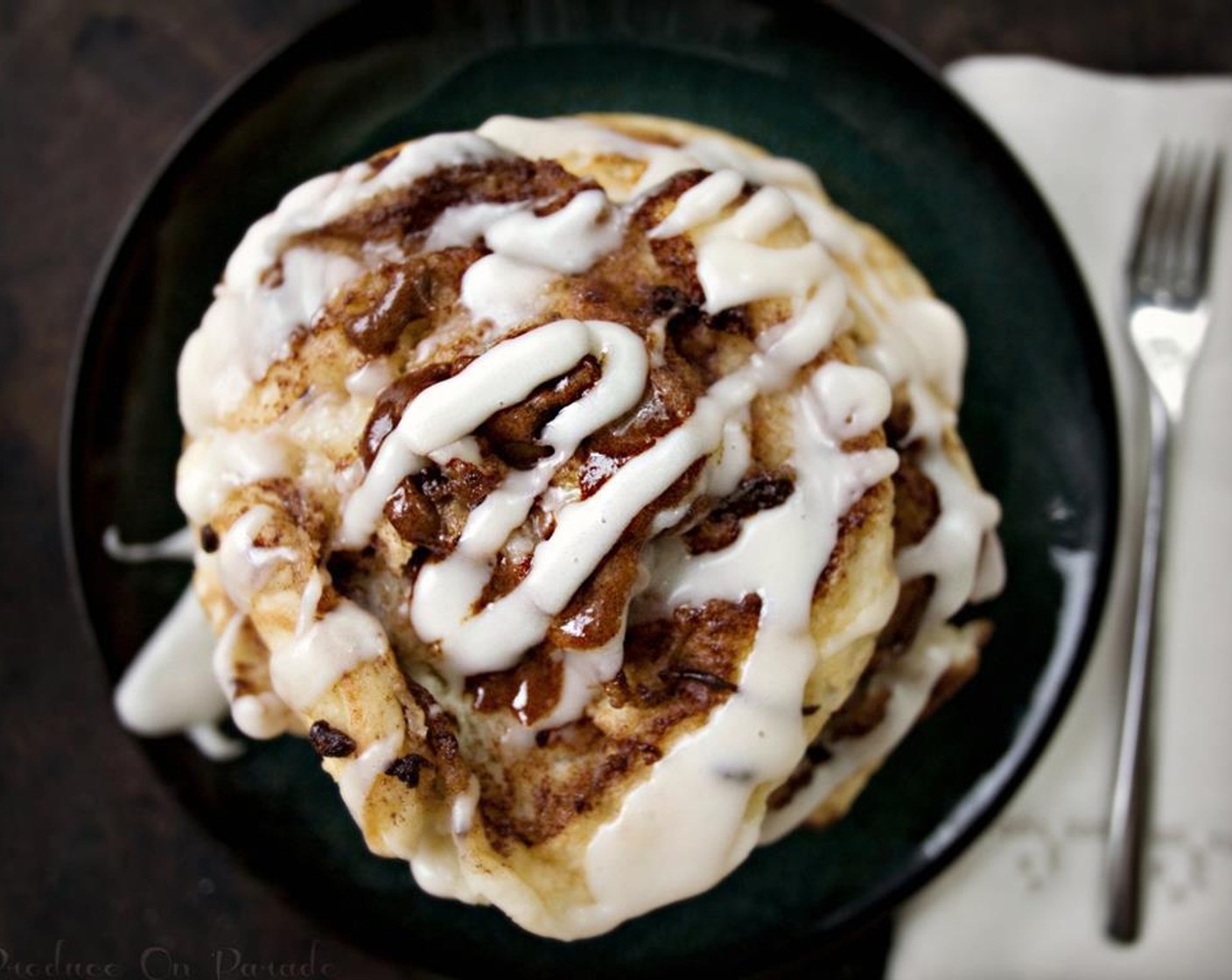 step 7 Serve the pancakes stacked high, hot, and drizzled with the coconut icing.