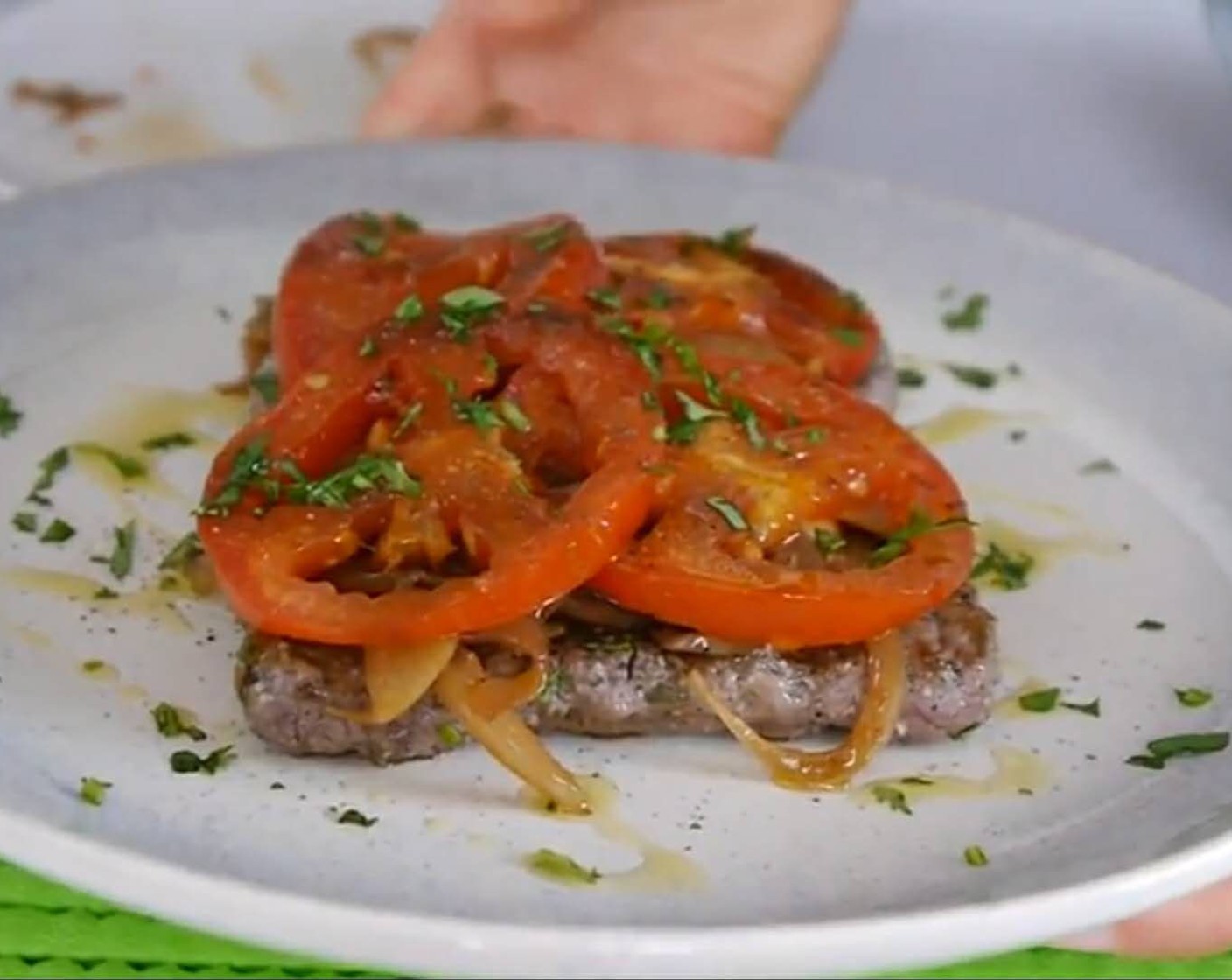 step 9 Then add the onions and spring onions covering all the steak. Then add the tomato slices again covering all the onions. Season the tomatoes with some sea salt and black pepper. This is very important to do otherwise you’ll have bland tomatoes.