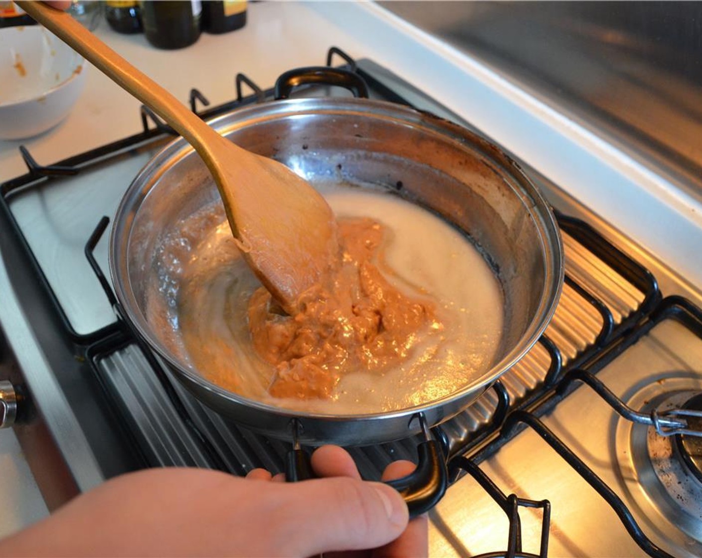 step 2 Remove from heat. Add Peanut Butter (1 cup) and Vanilla Extract (1 tsp).