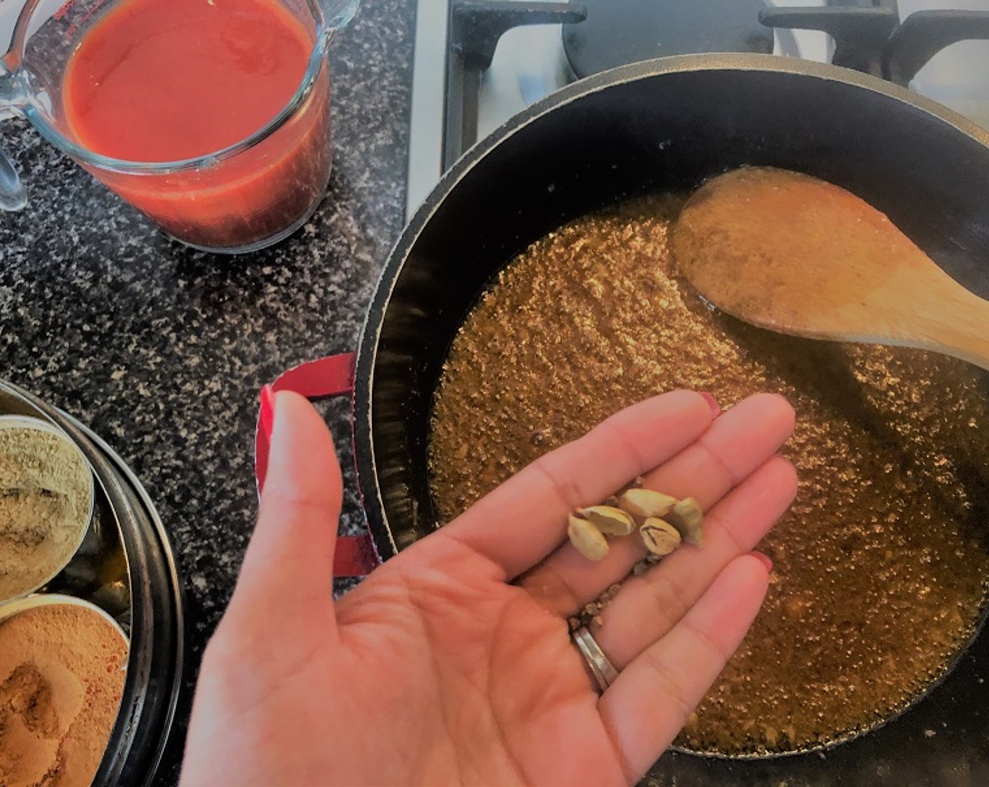 step 8 Next add in the Tomato Passata (2 1/2 cups) followed by the Red Chili Powder (1 tsp), Garam Masala (1/2 tsp), Simply Organic Cinnamon, Ground (1/2 tsp), Caster Sugar (1/2 tsp), and simmer for 8-10 minutes. When you see the oil begin to separate you will know the gravy is ready.