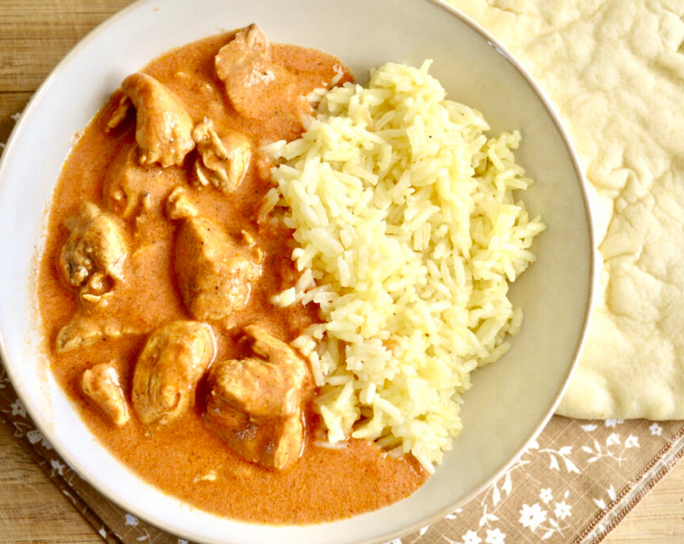 step 7 Serve the butter chicken with s rice and Naans (to taste).