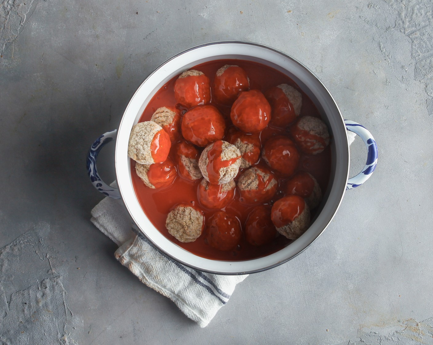 step 2 Add the Frozen Chicken Meatballs (1 bag) and Buffalo Sauce (1 bottle) to a medium saucepan. Cover and cook over medium heat for 20 minutes, or until warmed through.