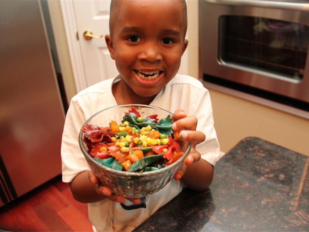 Step 9 of Rainbow Pasta Salad Recipe: Serve in bowls and enjoy!