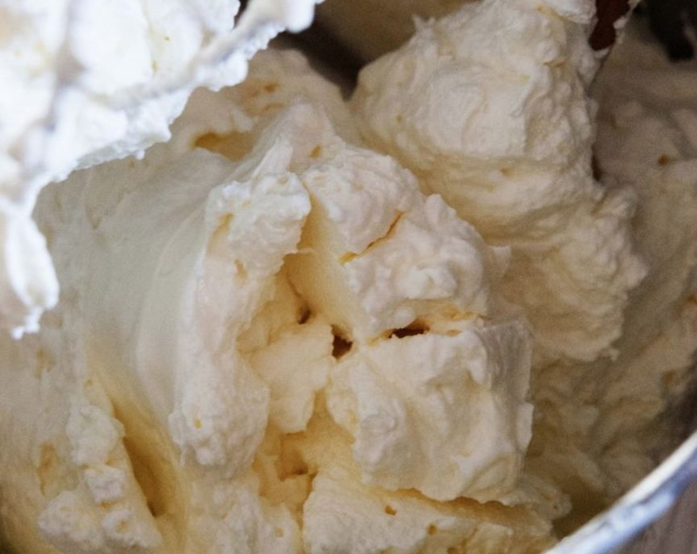 step 3 In the bowl of a stand mixer, whip together the Kemps Heavy Whipping Cream (1 cup) and Granulated Sugar (2/3 cup). Slowly add in the Cream Cheese (2 cups) while stirring on low.