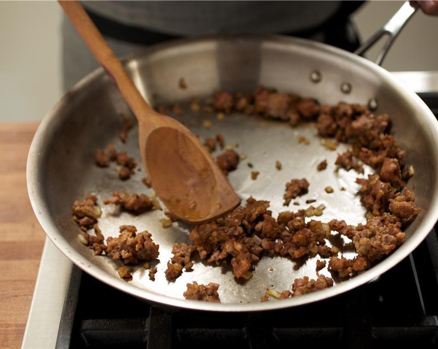 step 3 Heat Olive Oil (1 Tbsp) in a large saute pan over medium heat. Add the onion and saute until tender and being to color, for about six minutes.