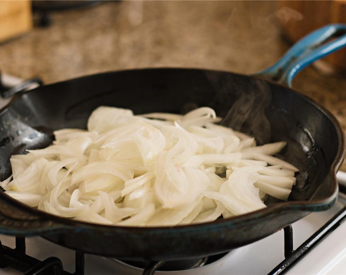 step 7 Heat a skillet over low heat and add 2 tablespoons of butter and the onions. Caramelize for 45 minutes to 1 hour, stirring occasionally, until the onions are golden brown. Add a pinch of salt to taste.