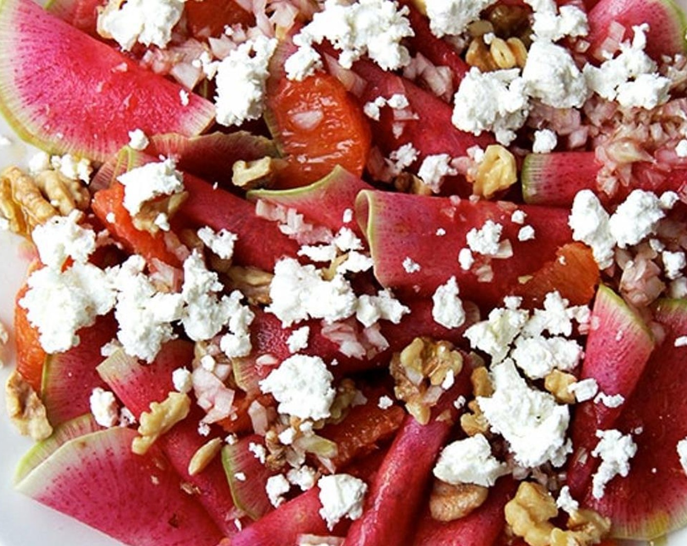 step 5 Scatter Walnut (1 handful) and Goat Cheese (to taste) to taste over the radishes and oranges. Pour macerated shallots and vinegar over top. Drizzle Olive Oil (to taste) over top.