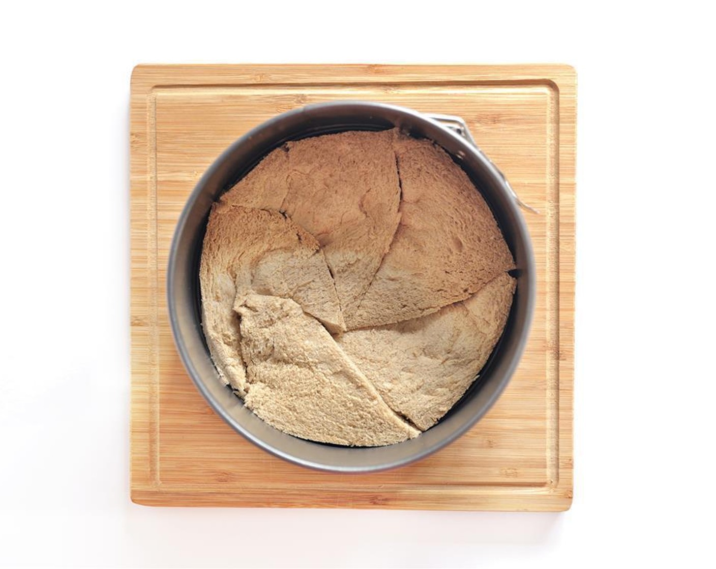 step 1 Remove crusts from Whole Wheat Bread (12 slices). Slice whole wheat bread into triangles and arrange on the bottom of springform pan. Depending on the size of your bread and pan, the number of slices you use for each layer will vary.