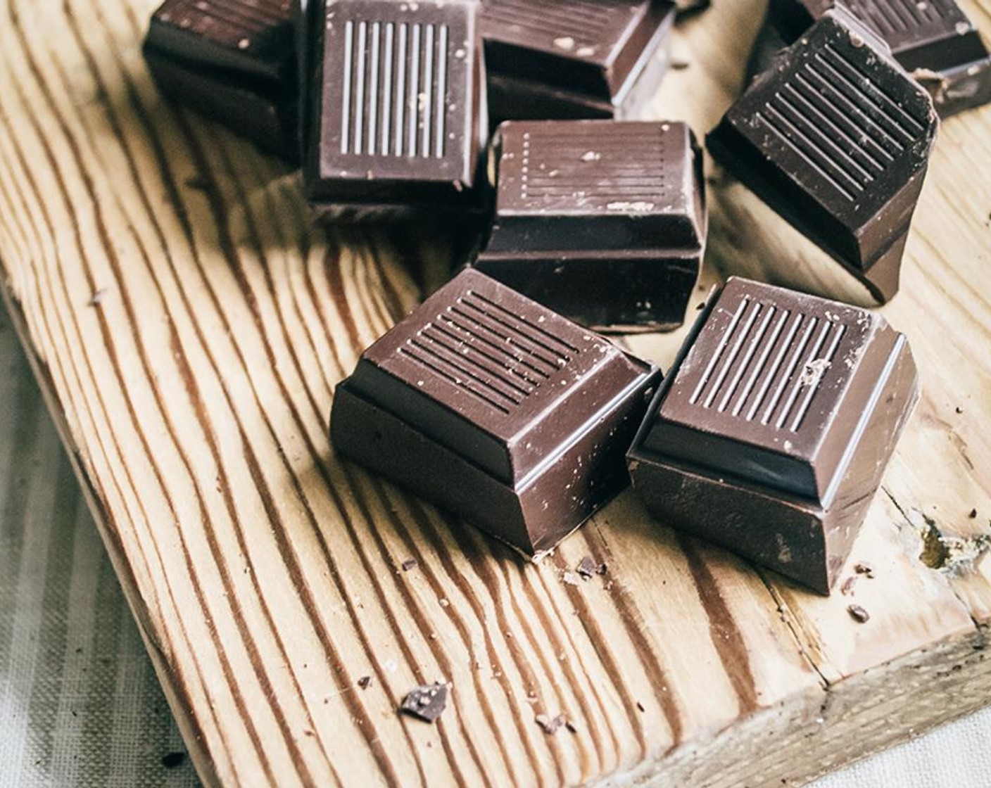 step 1 Add the Dark Chocolate (1/2 cup) to a small saucepan and cook over low heat with two tablespoons of the Organic Butter (2 Tbsp). Stir constantly to prevent burning.