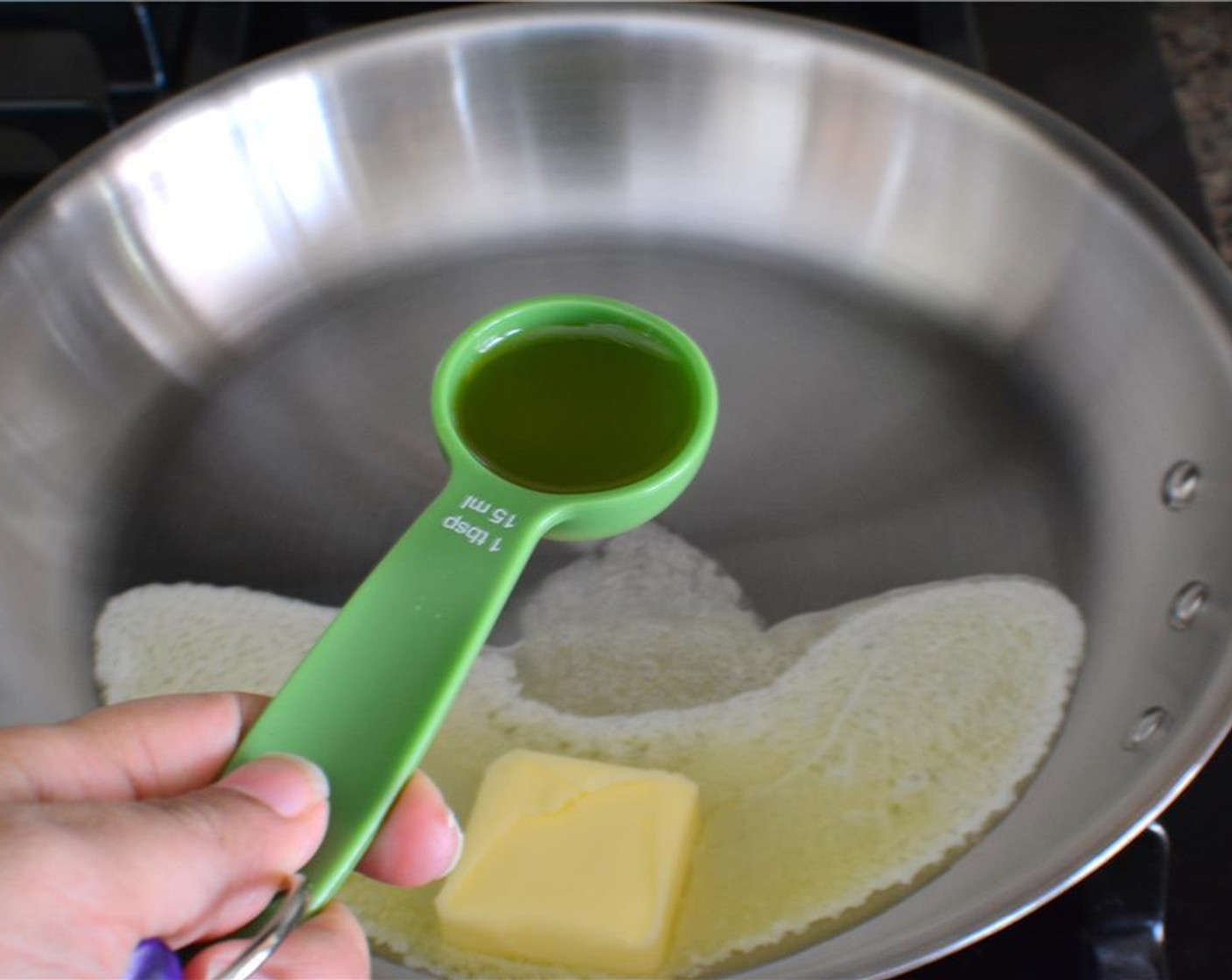 step 1 Add Butter (3 Tbsp) and Olive Oil (1 Tbsp) in a saucepan on low until the butter melts. Turn the heat off.