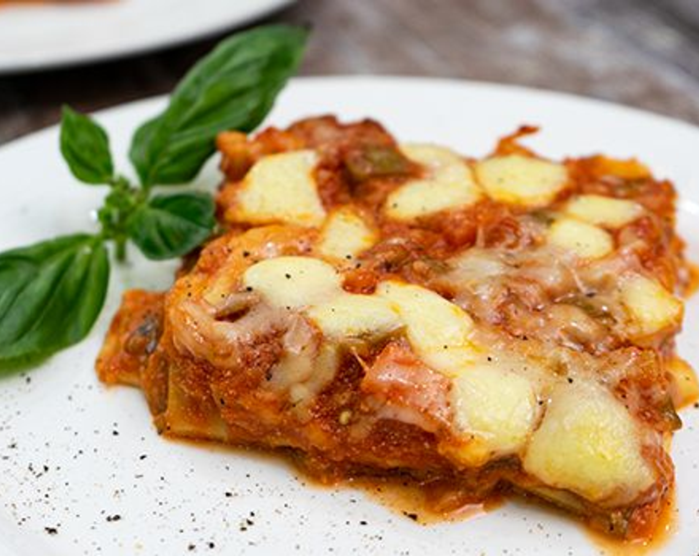 step 24 Of course if you are crazy about parmesan cheese, you can grate even more Grated Parmesan Cheese (to taste) on top of your vegetarian lasagna to serve! Enjoy!