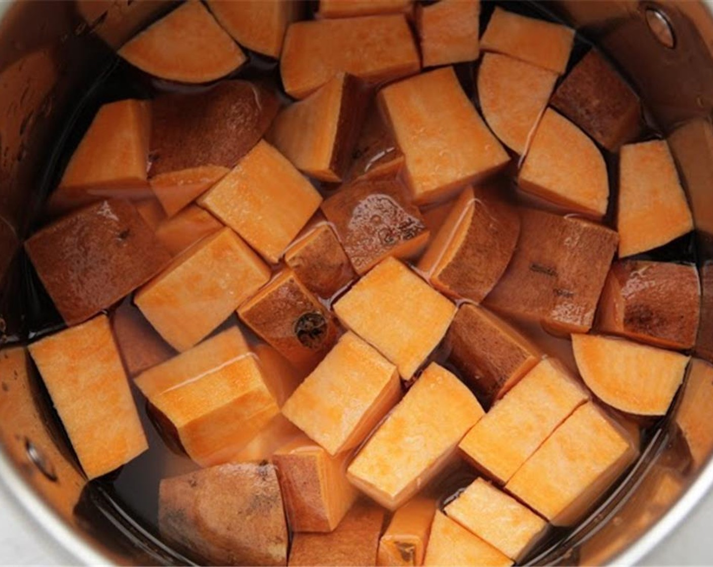 step 7 Cook the sweet potatoes until all the liquid has evaporated and sweet potatoes are tender.