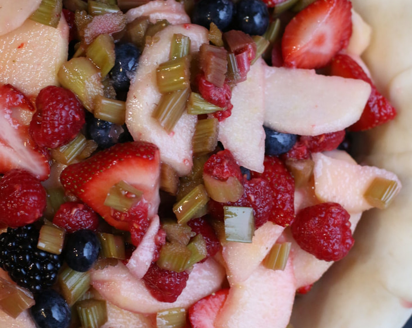 step 13 Spoon fruit mixture into dough-lined pie plate, mounding slightly in middle. Spread your chunks of Butter (3 Tbsp) evenly over the top of the fruit.