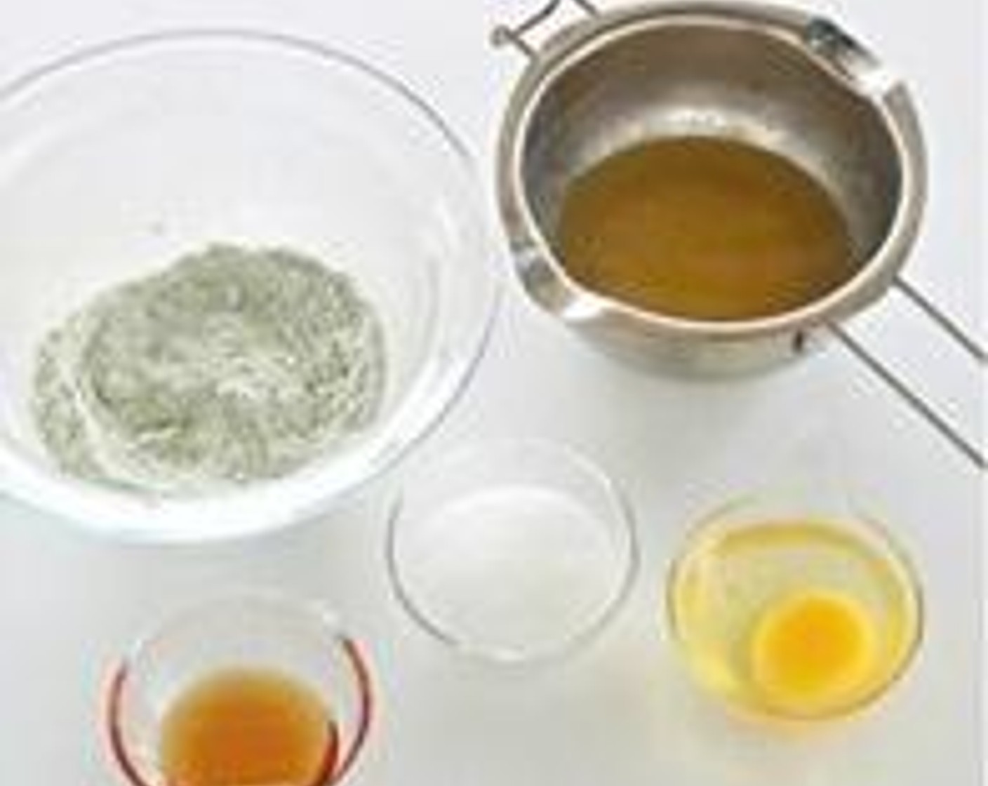 step 1 Sift Cake Flour (1/4 cup), Matcha Powder (1 tsp) and Baking Powder (1/4 tsp) together and set aside.