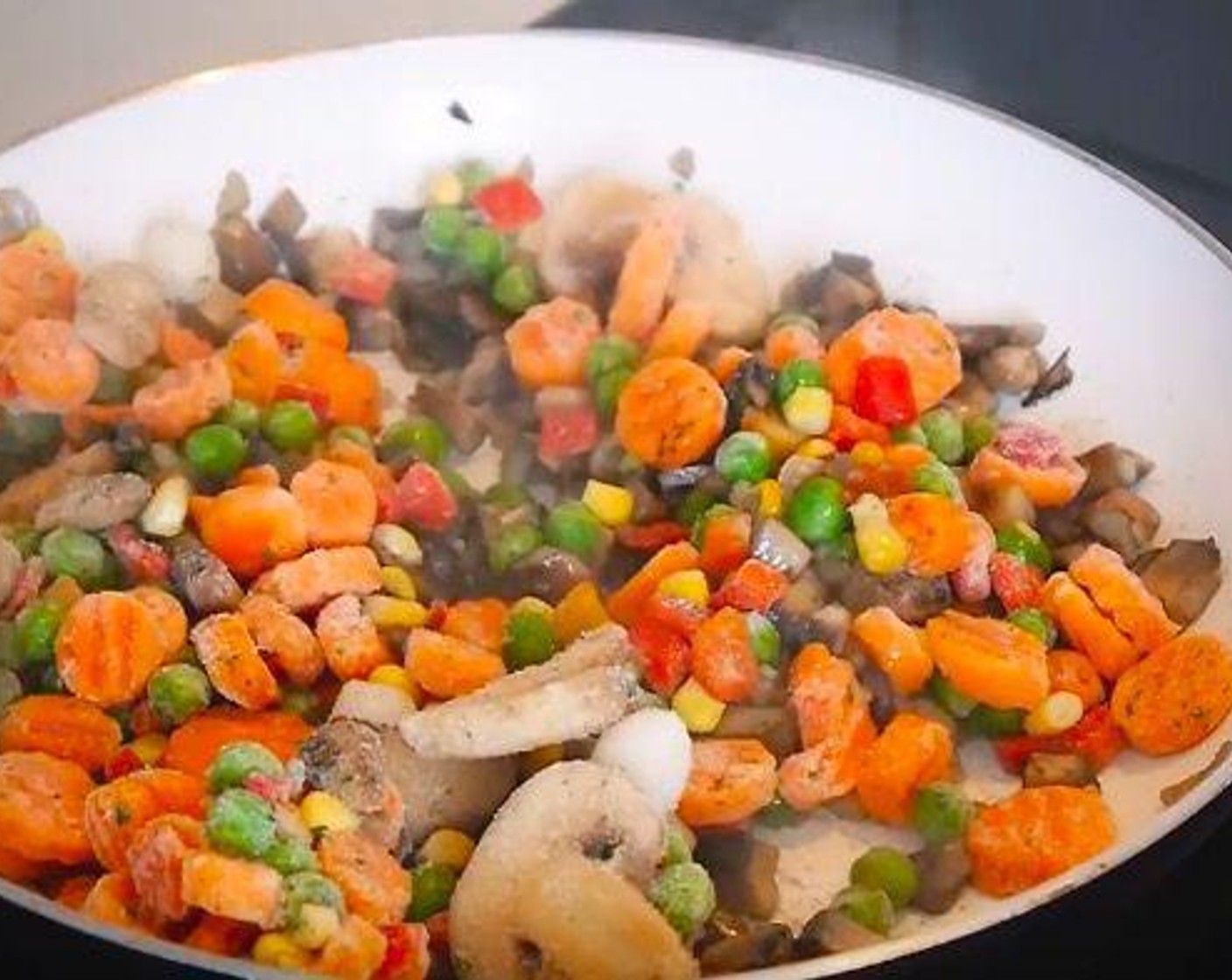 step 1 In a skillet on the medium heat, stir fry Portobello Mushrooms (4), White Onion (1/2), and Garlic (1 clove) for 6 minutes. Then add Frozen Mixed Vegetables (2 cups), cook for another 6 minutes. Poor the mixture into the cooked White Rice (2 1/2 Tbsp) and Quinoa (2 cups) and mix well.