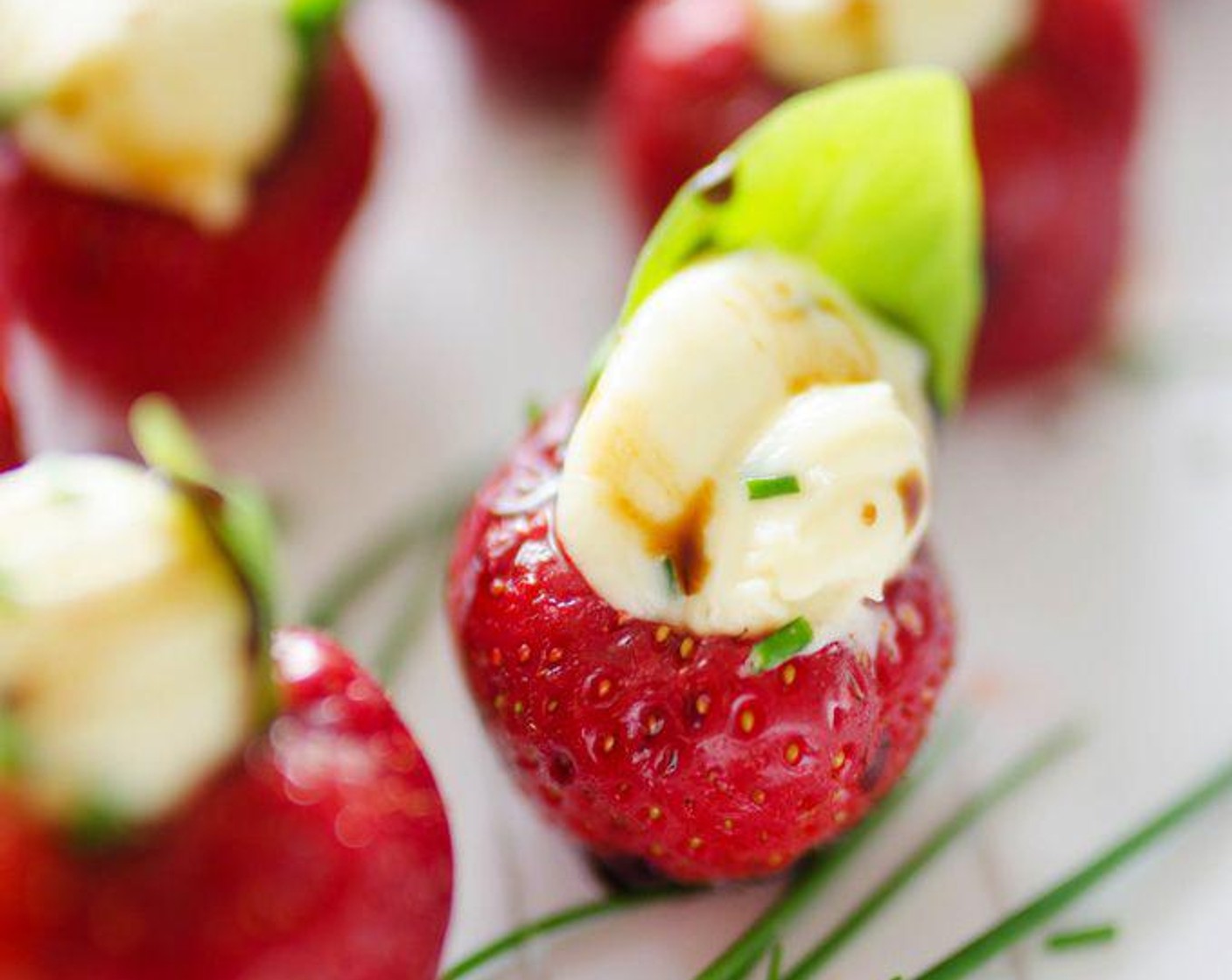 Herby Whipped Brie Stuffed Strawberries