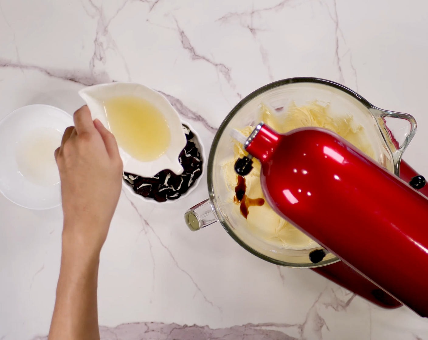 step 7 Drizzle in Vanilla Extract (1 tsp) and Lemon Juice (1/2).