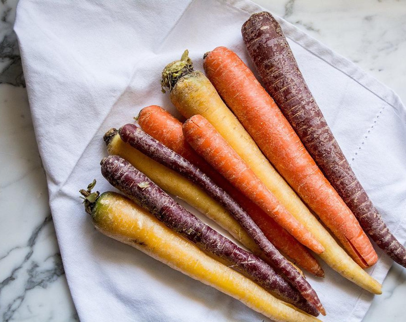 step 2 Add Rainbow Carrots (4 1/2 cups) to oven-safe baking dish.