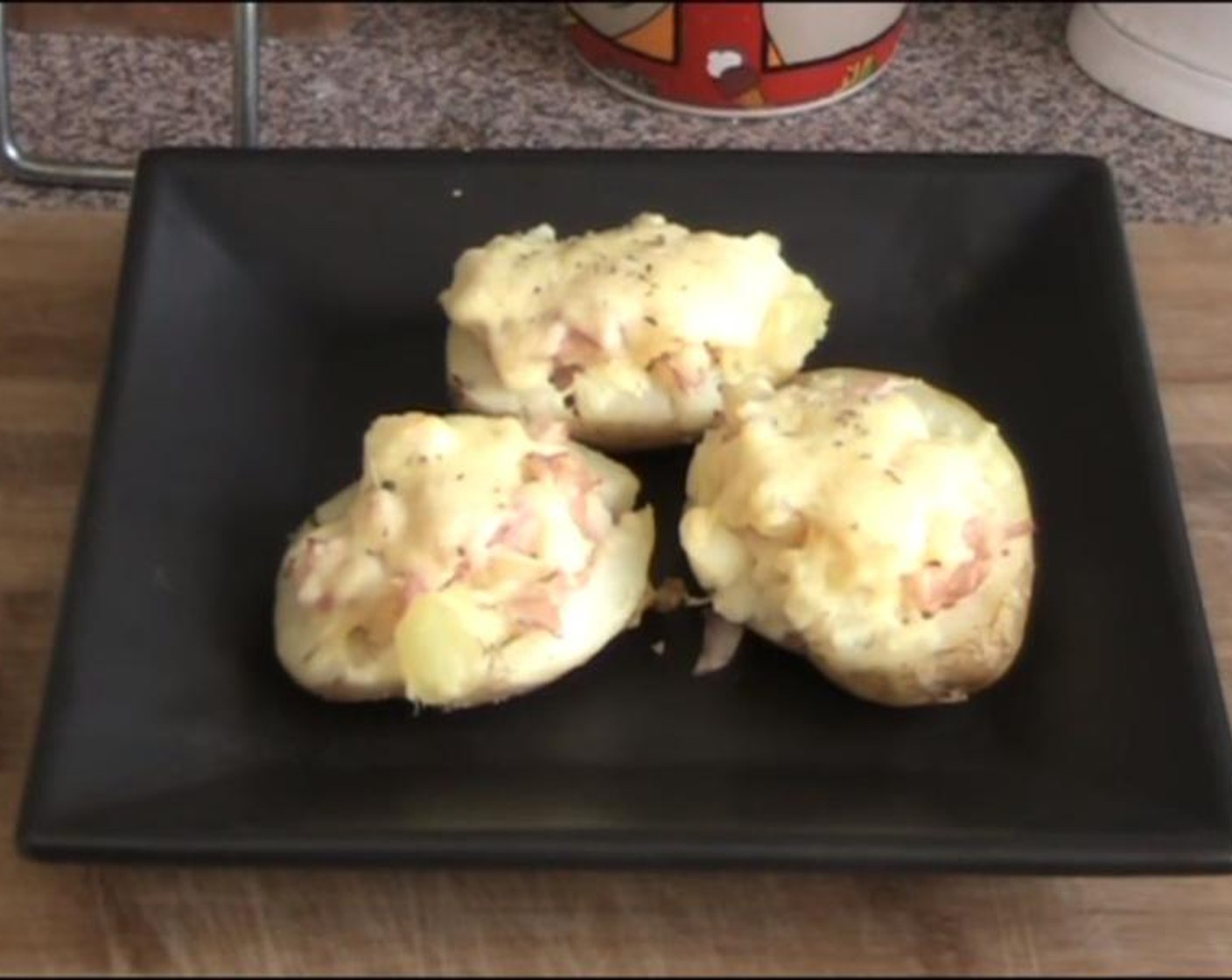 step 4 Top the potatoes with Cheese (1/2 cup). Put them back into the oven at 200 degrees C (400 degrees F) for fifteen minutes. Take out and serve.