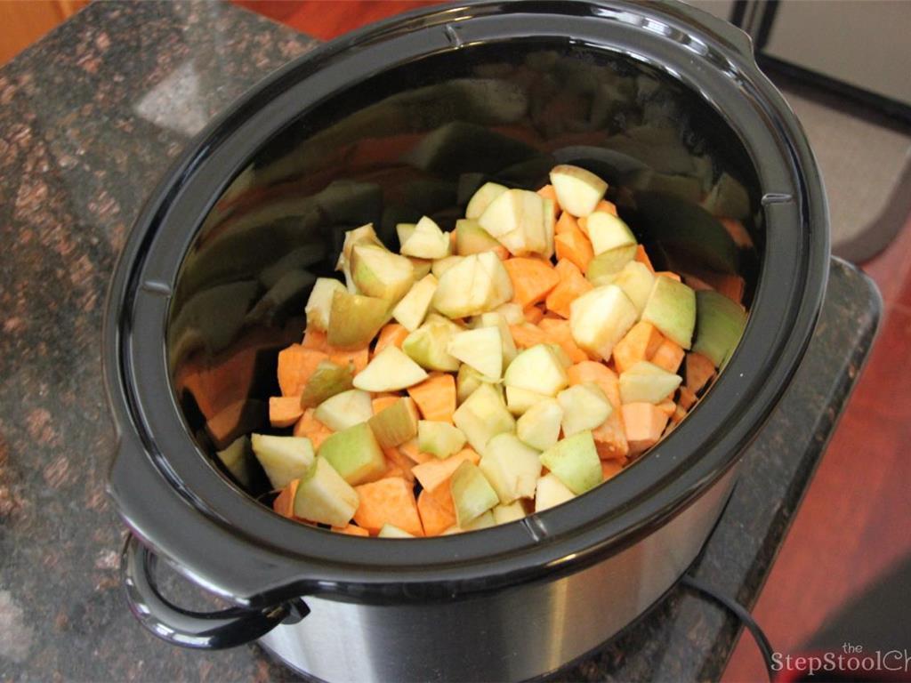 Step 1 of Sweet Potato and Apple Soup Recipe: Cube Sweet Potato (3) and Apple (3) and place them in a slow cooker. Add Low-Sodium Chicken Broth (3 cup), Apple Cider (1 cup), Ground Cinnamon (2 teaspoon), Brown Sugar (1 tablespoon), Lemon (1) juice, and Sage Leaves (1 tablespoon). Cook on low heat for 5 to 6 hours.