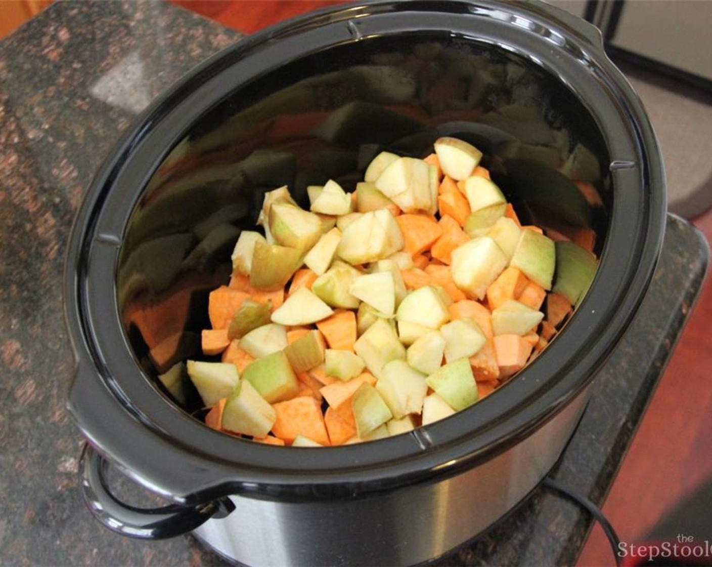 step 1 Cube Sweet Potatoes (3) and Apples (3) and place them in a slow cooker. Add Low-Sodium Chicken Broth (3 cups), Apple Cider (1 cup), Ground Cinnamon (1/2 Tbsp), Brown Sugar (1 Tbsp), Lemon (1) juice, and Sage Leaves (1 Tbsp). Cook on low heat for 5 to 6 hours.