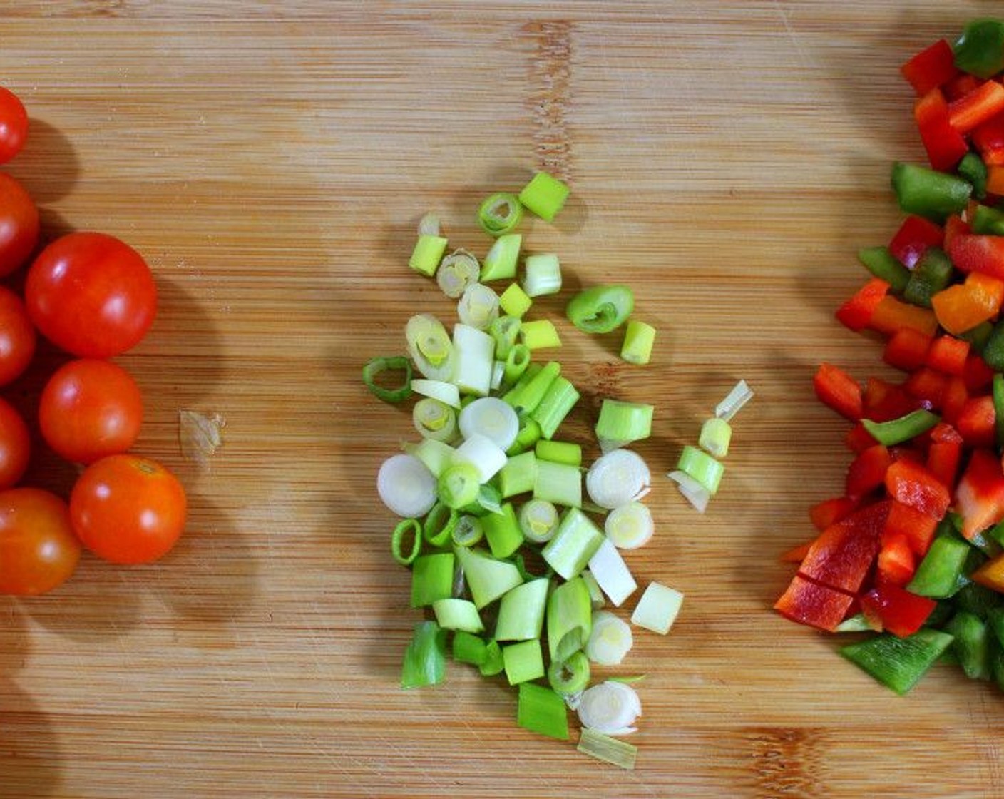 step 8 For the “garnish”, cut Scallions (4 stalks), wash Grape Tomatoes (2 cups) and add the remaining diced peppers.
